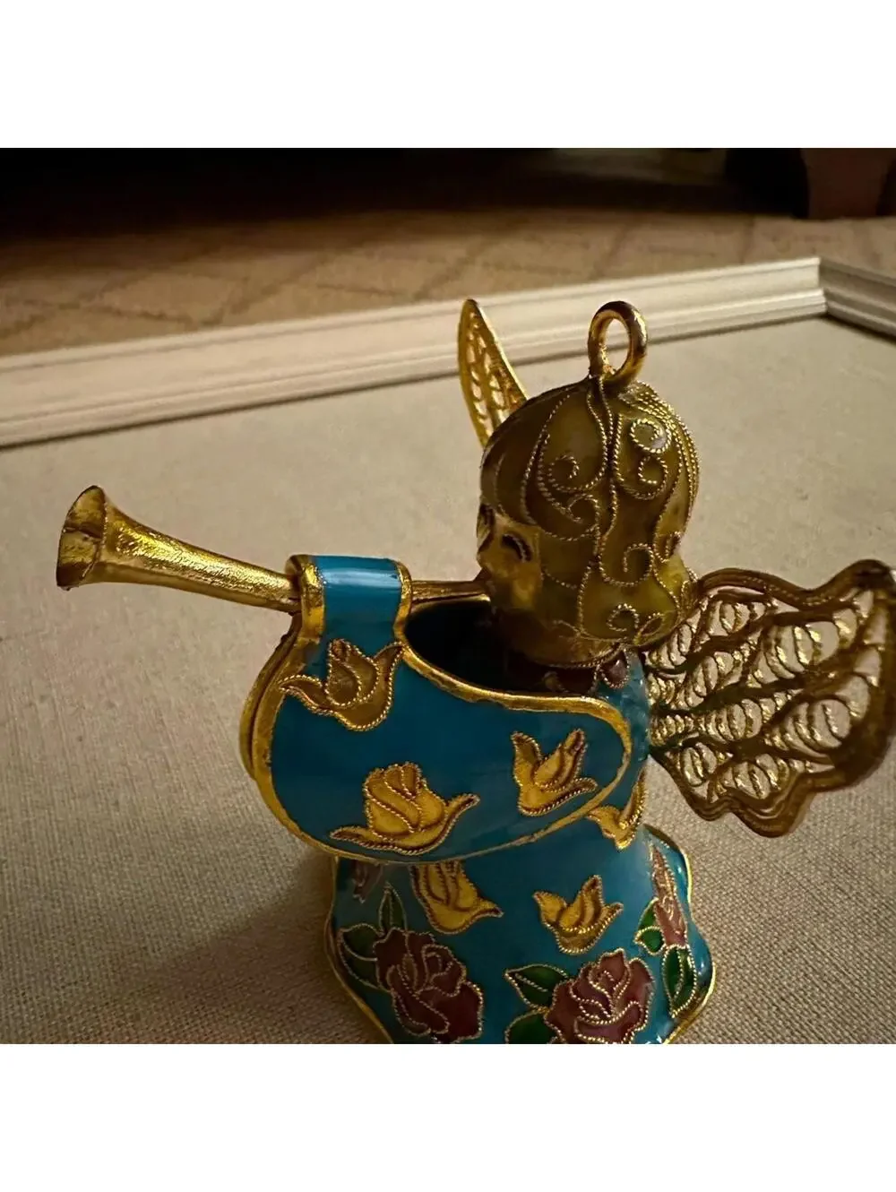 Vintage hand painted and glazed ceramic angel with trumpet 3d details